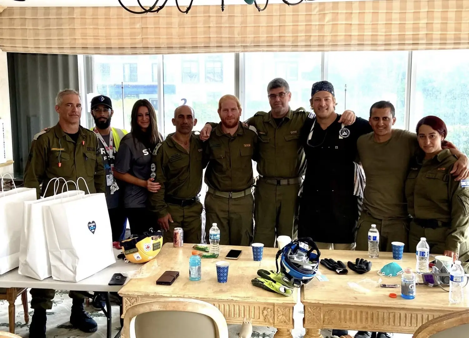 Chef Paul with members of a search-and-rescue delegation in Surfside