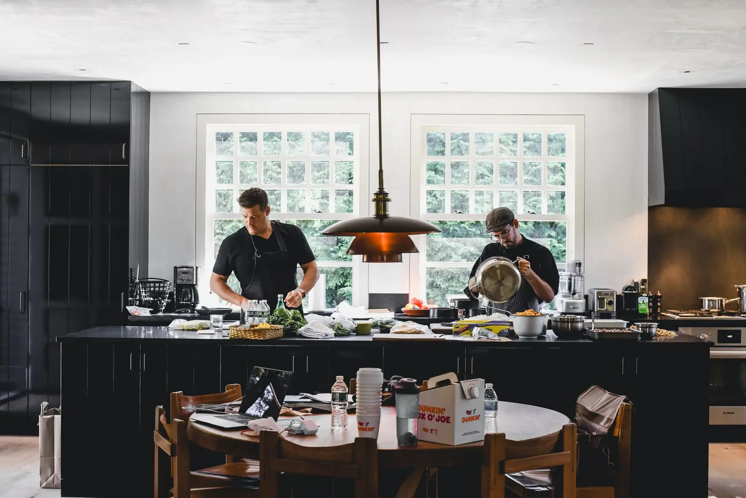 Chef Paul Aceto and his team preparing an event in a private kitchen